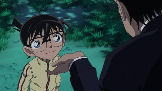 Assistir Detective Conan  Episódio 700 - A Sombra se Aproxima do Segredo de Haibara! (Parte 2)	